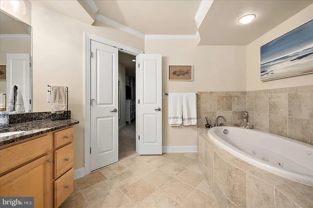 a bedroom with two beds and a window