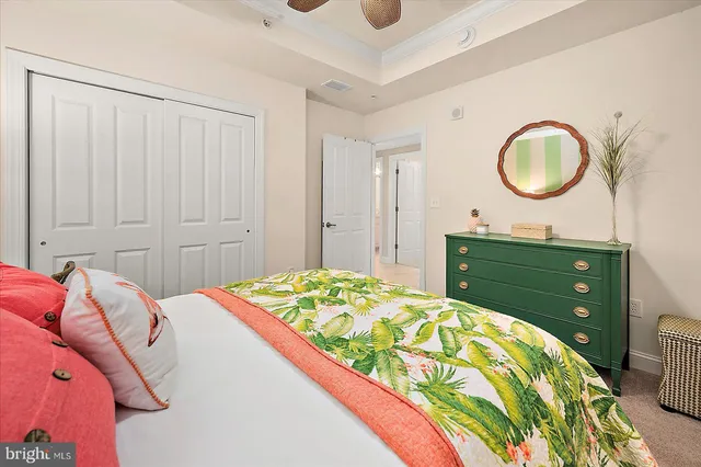 a balcony with a table and chairs