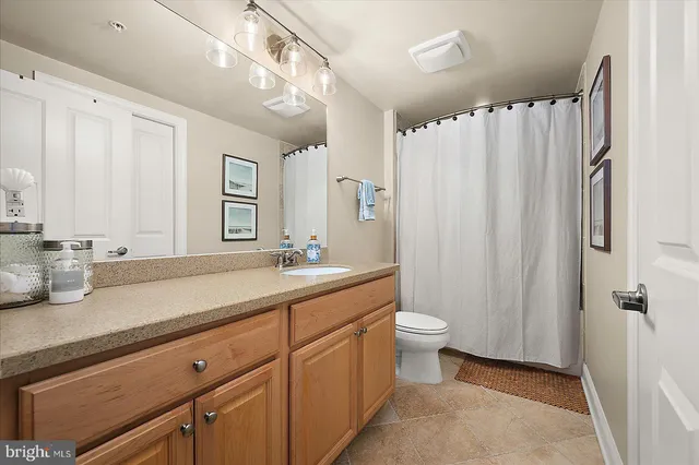 a view of a swimming pool with a lounge chair