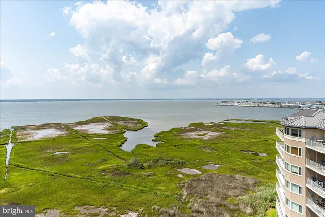 a view of a living room and dining room