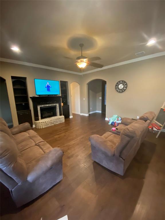922 Antler Drive Haughton, LA 71037 - Photo 3 of 9 a living room with furniture and a flat screen tv