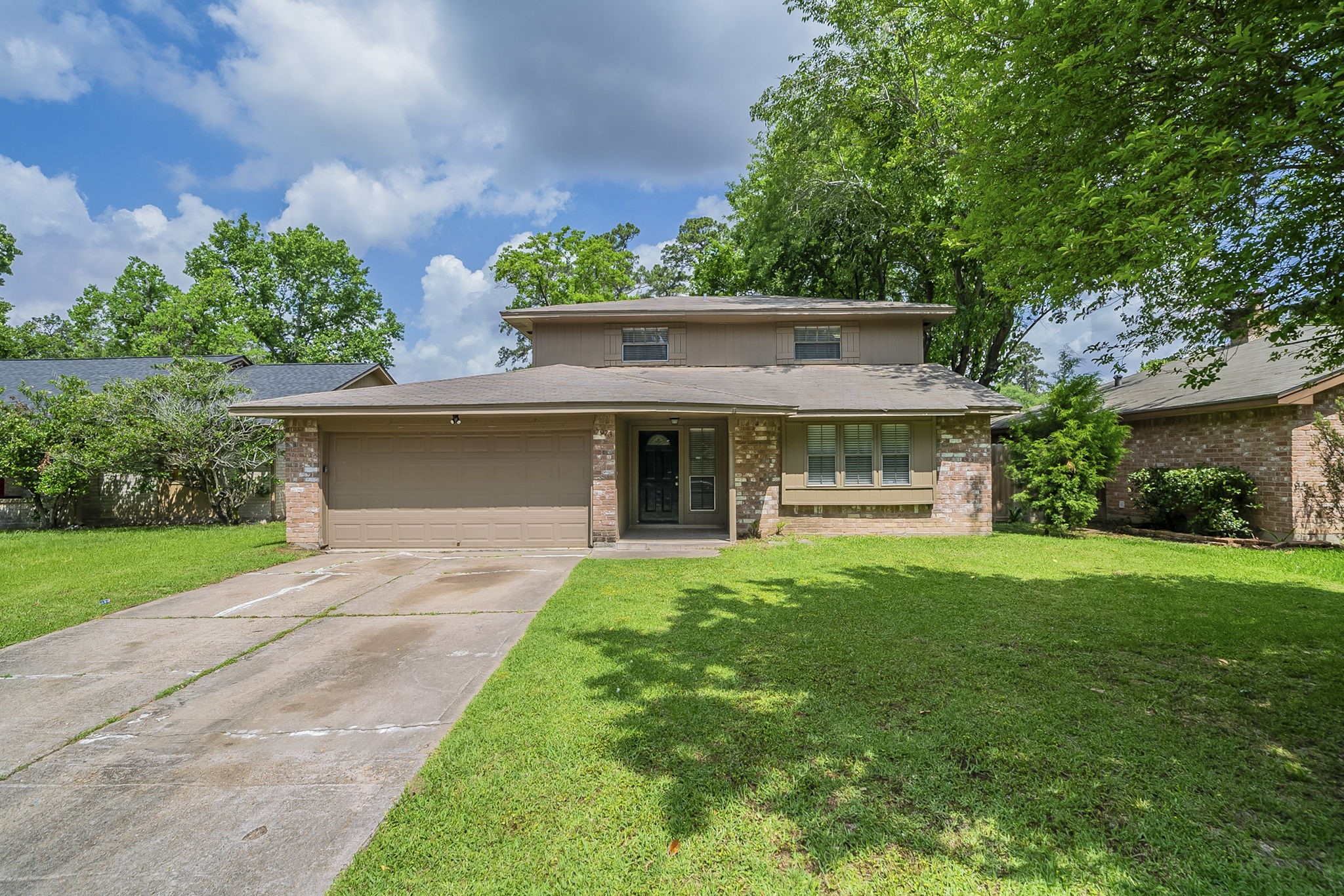 5023 Glendower Drive Spring, TX 77373 - Photo 1 of 33 a front view of a house with a yard