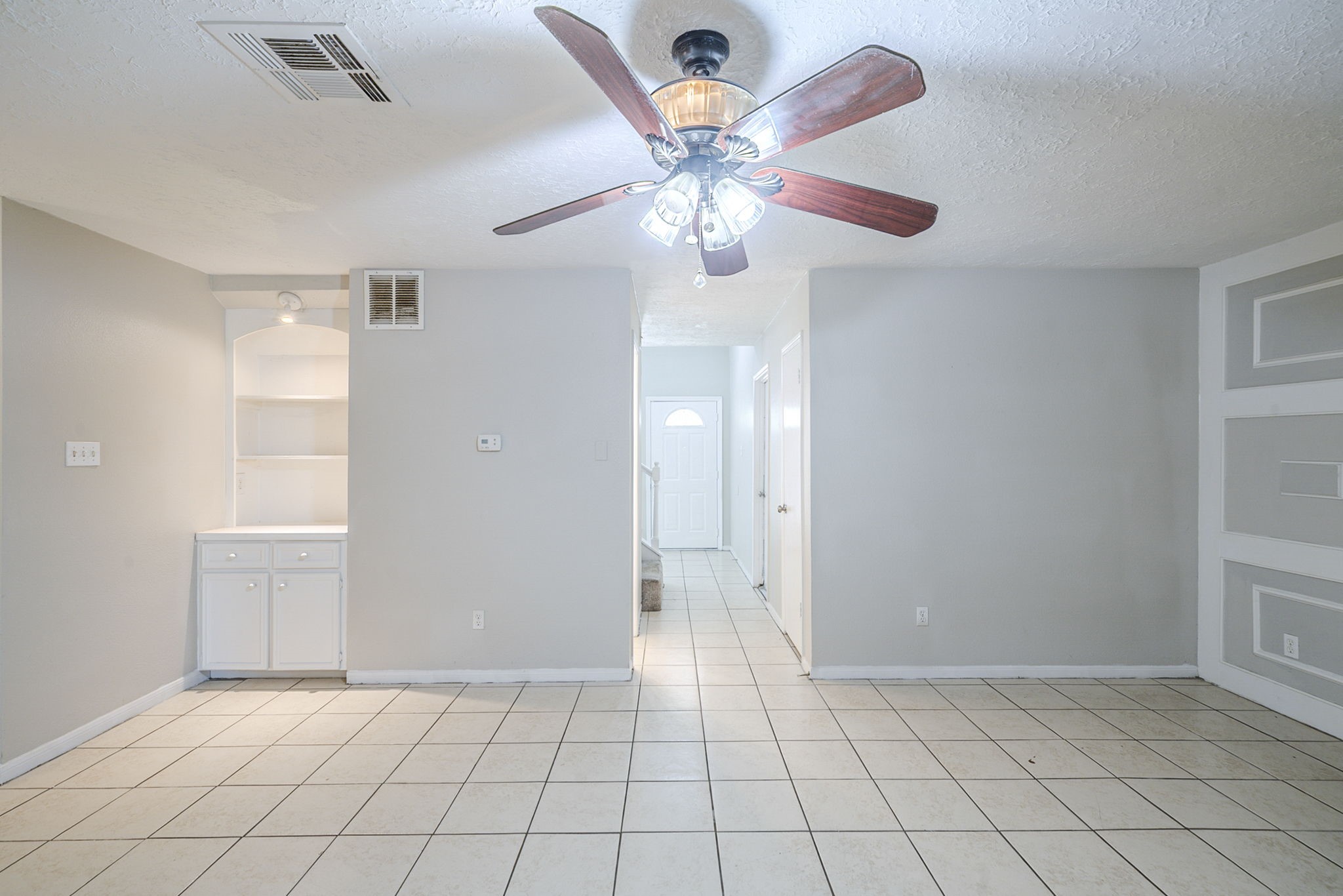 5023 Glendower Drive Spring, TX 77373 - Photo 13 of 33 a view of an empty room and chandelier fan