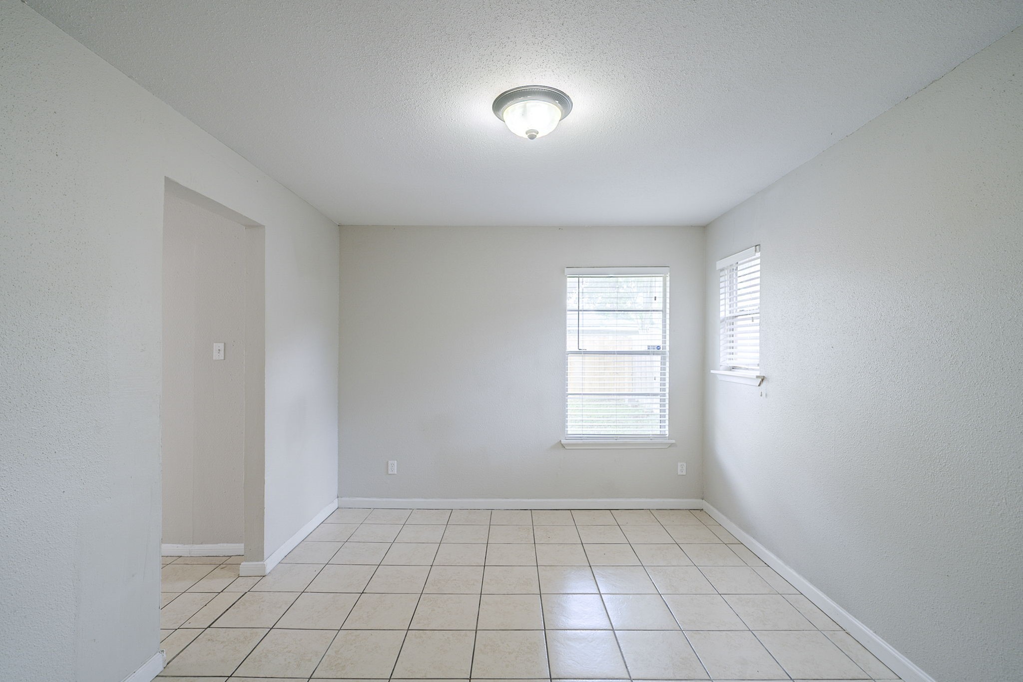 5023 Glendower Drive Spring, TX 77373 - Photo 18 of 33 an empty room with windows