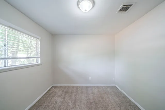 an empty room with a window