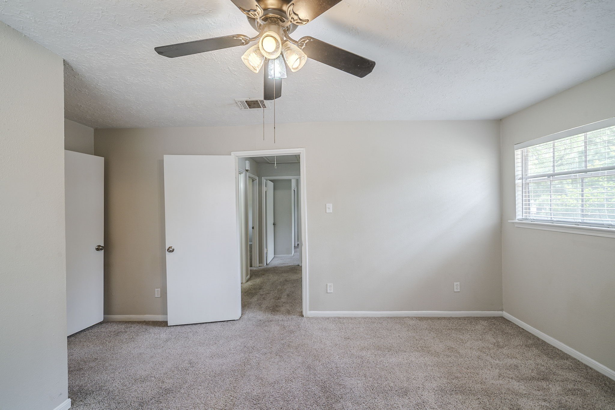 5023 Glendower Drive Spring, TX 77373 - Photo 27 of 33 wooden floor in an empty room with a window