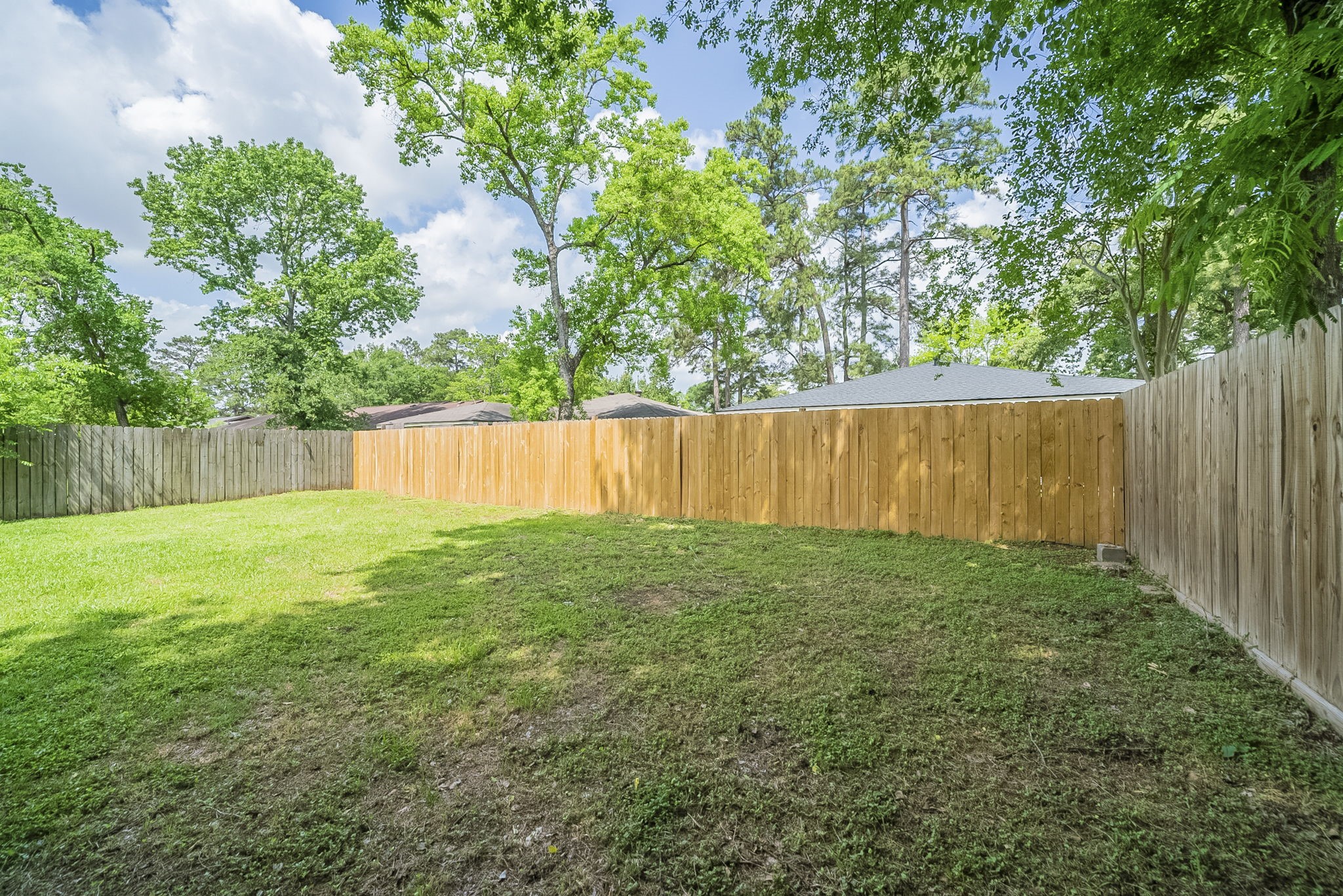 5023 Glendower Drive Spring, TX 77373 - Photo 29 of 33 a view of outdoor space with deck and backyard