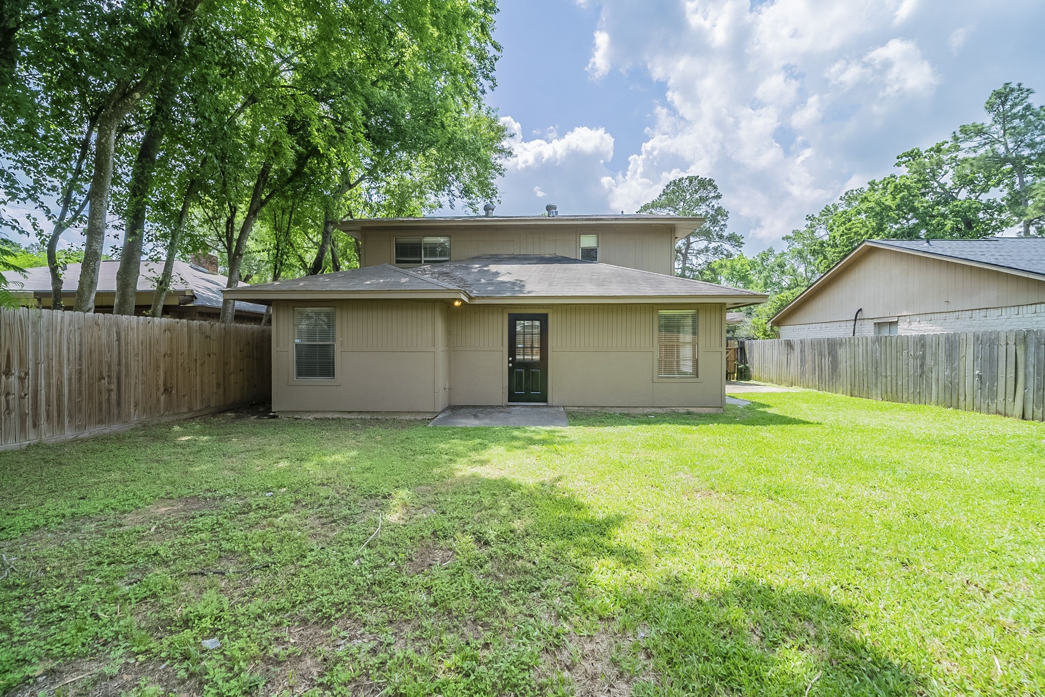 5023 Glendower Drive Spring, TX 77373 - Photo 30 of 33 a view of a backyard with a garden