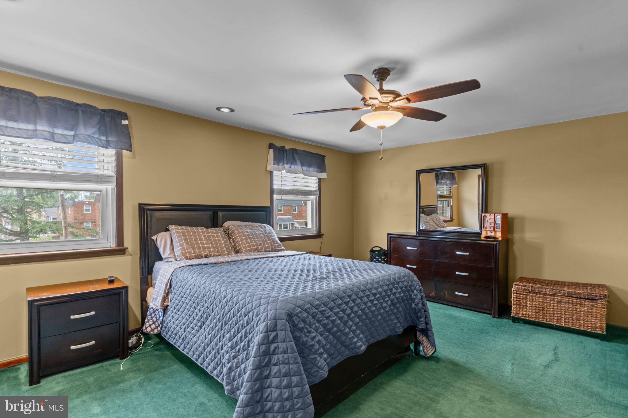 12413 Barbary Road Philadelphia, PA 19154 - Photo 14 of 29 a bedroom with a bed and a chandelier