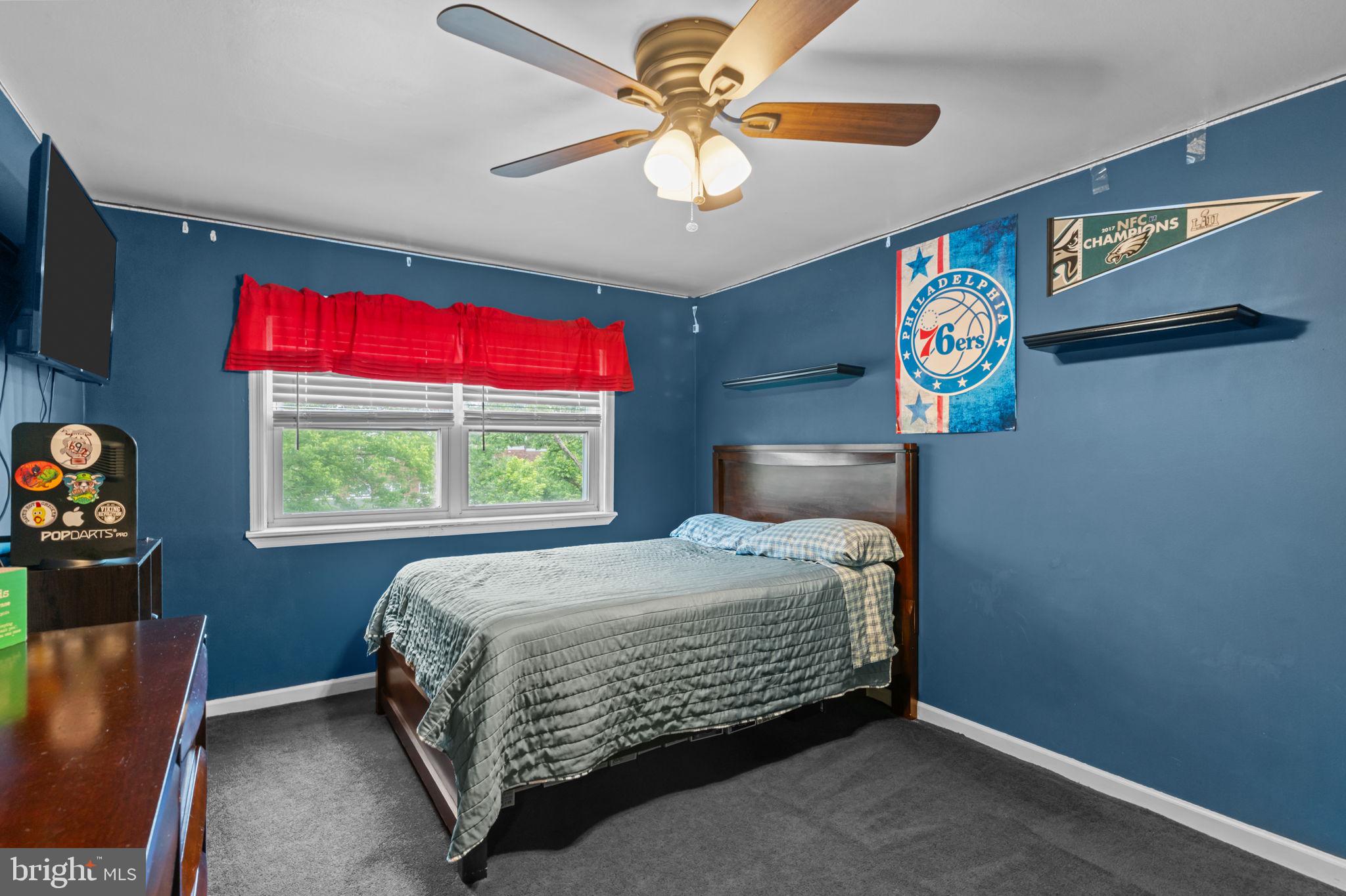 12413 Barbary Road Philadelphia, PA 19154 - Photo 18 of 29 a bedroom with a bed and a window