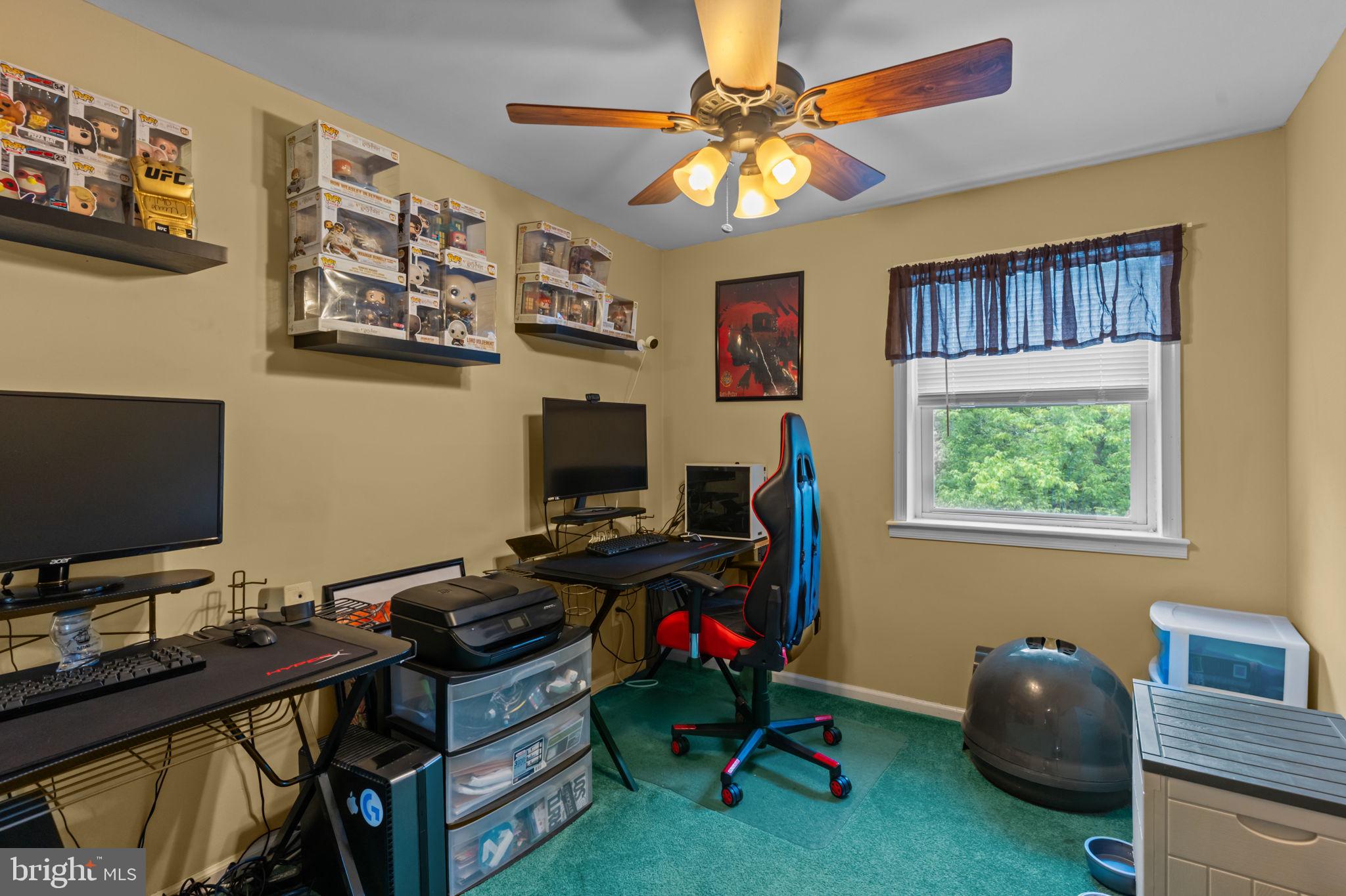 12413 Barbary Road Philadelphia, PA 19154 - Photo 19 of 29 a view of a workspace with furniture and a window
