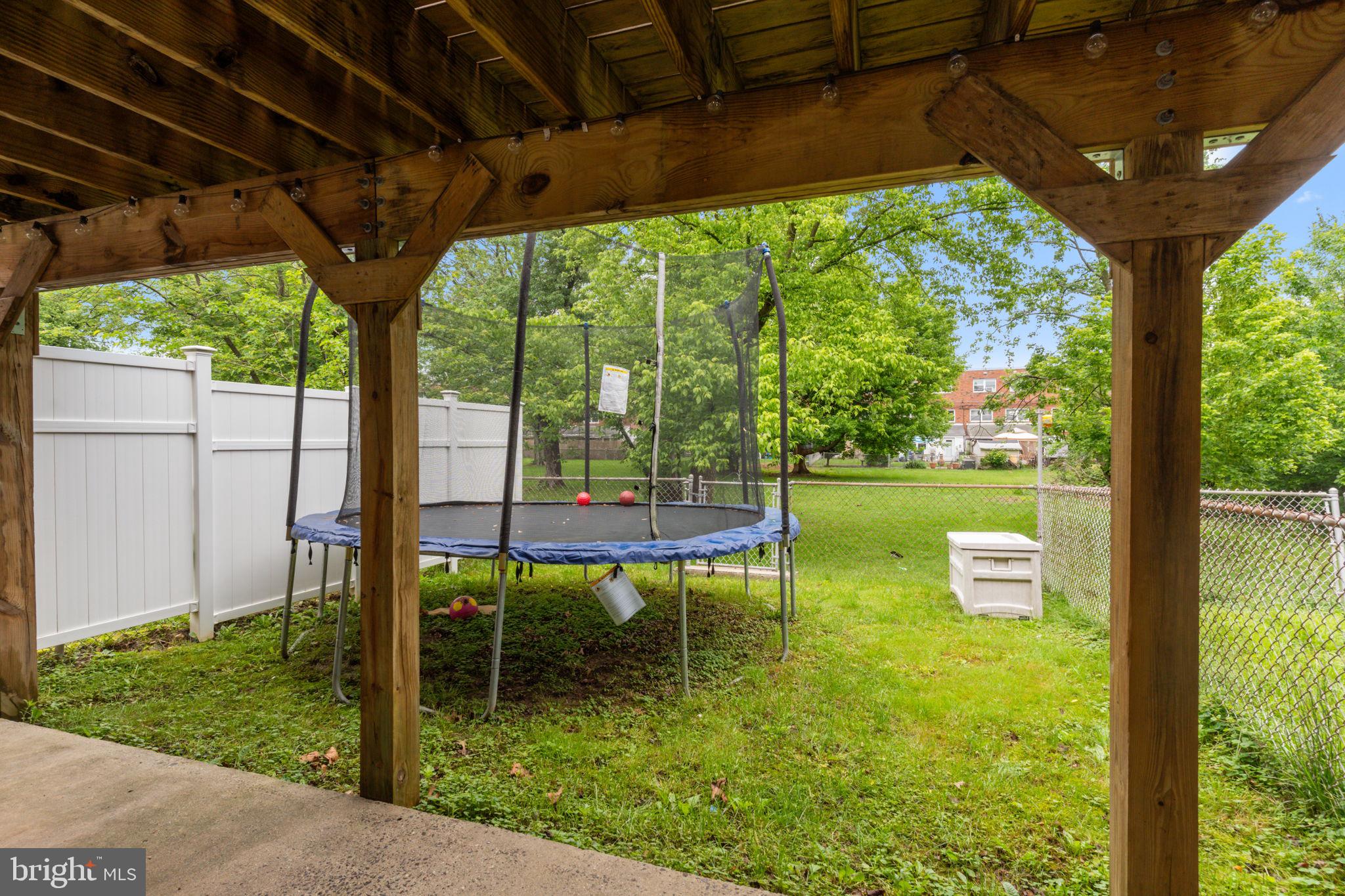 12413 Barbary Road Philadelphia, PA 19154 - Photo 28 of 29 a view of a porch with furniture and a yard