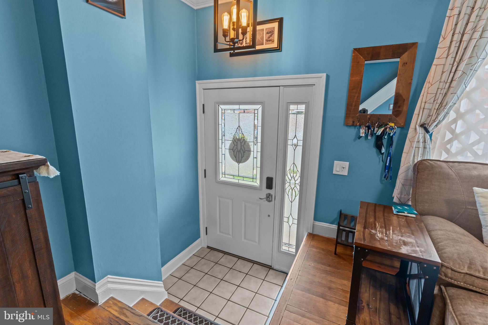 12413 Barbary Road Philadelphia, PA 19154 - Photo 5 of 29 a view of a hallway with furniture and wooden floor