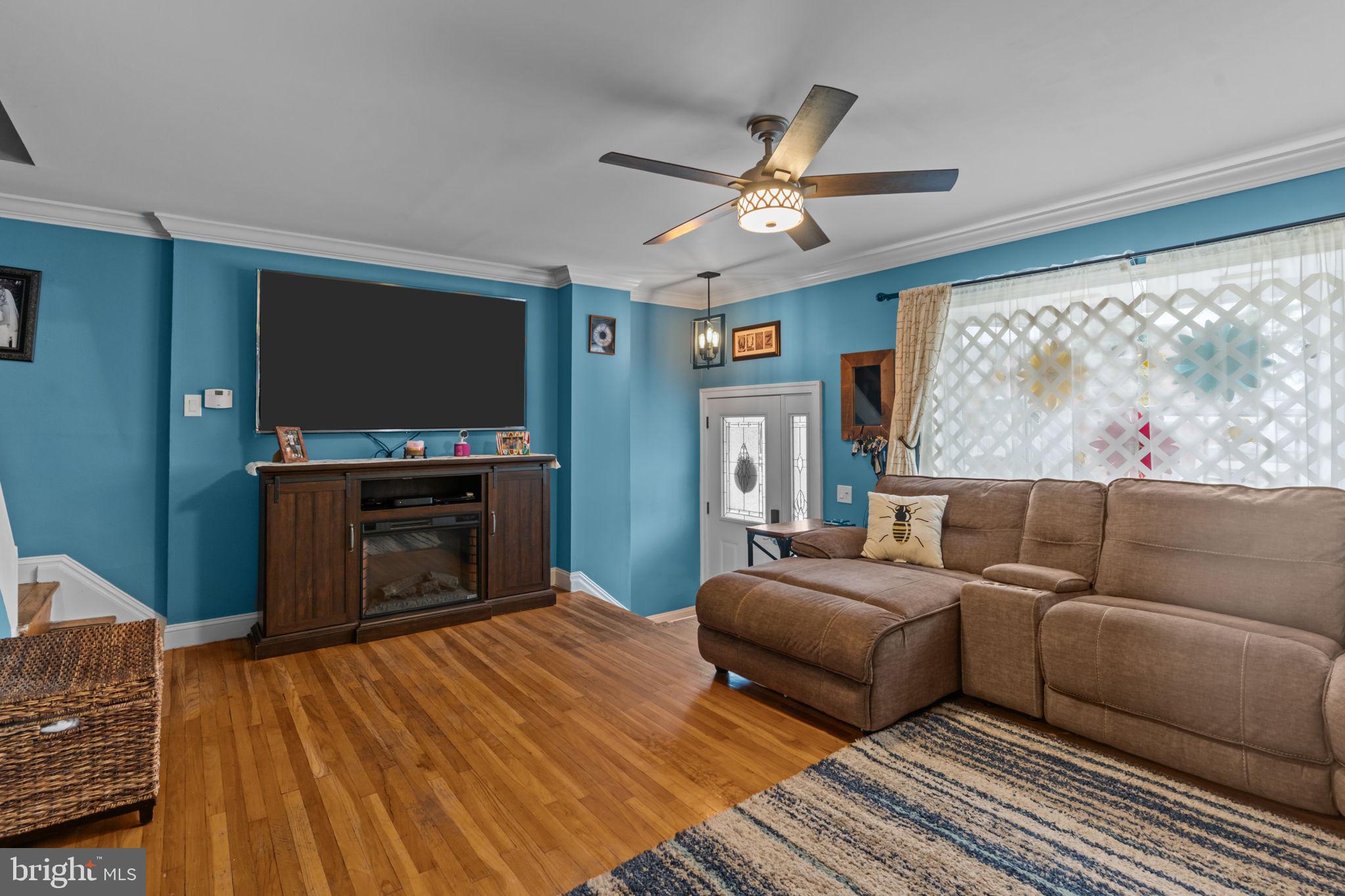 12413 Barbary Road Philadelphia, PA 19154 - Photo 7 of 29 a living room with furniture and a fireplace