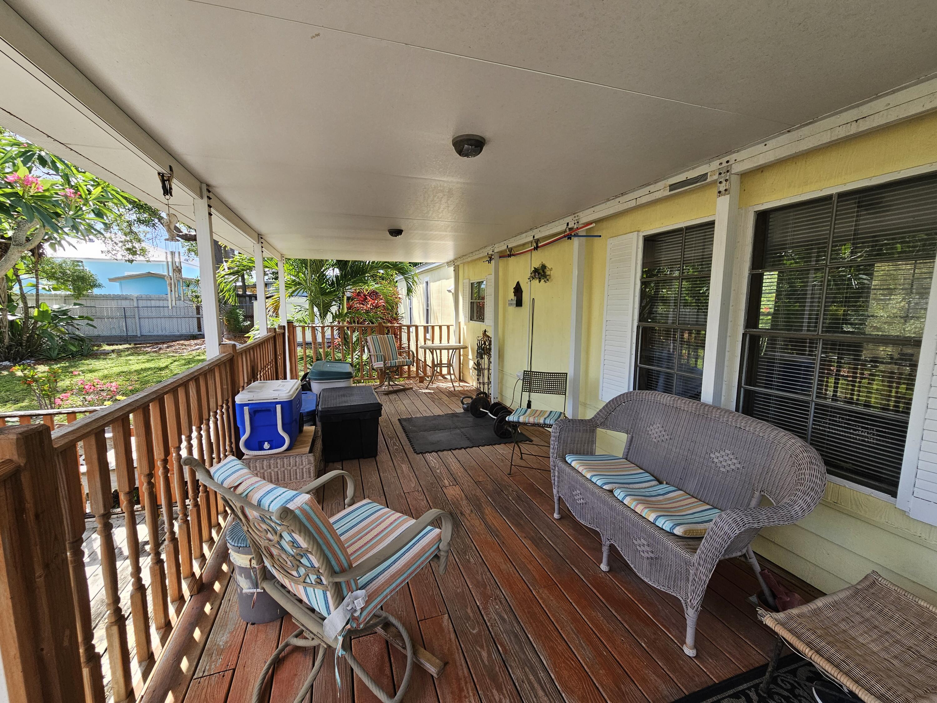917 Plantation Road Key Largo, FL 33037 - Photo 8 of 31 Shaded Front Porch