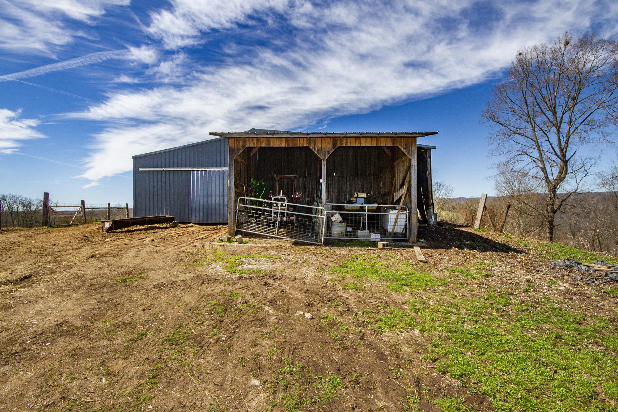1201 Manley Road Rutledge, TN 37861 - Photo 6 of 27 a view of a house with a yard and garage