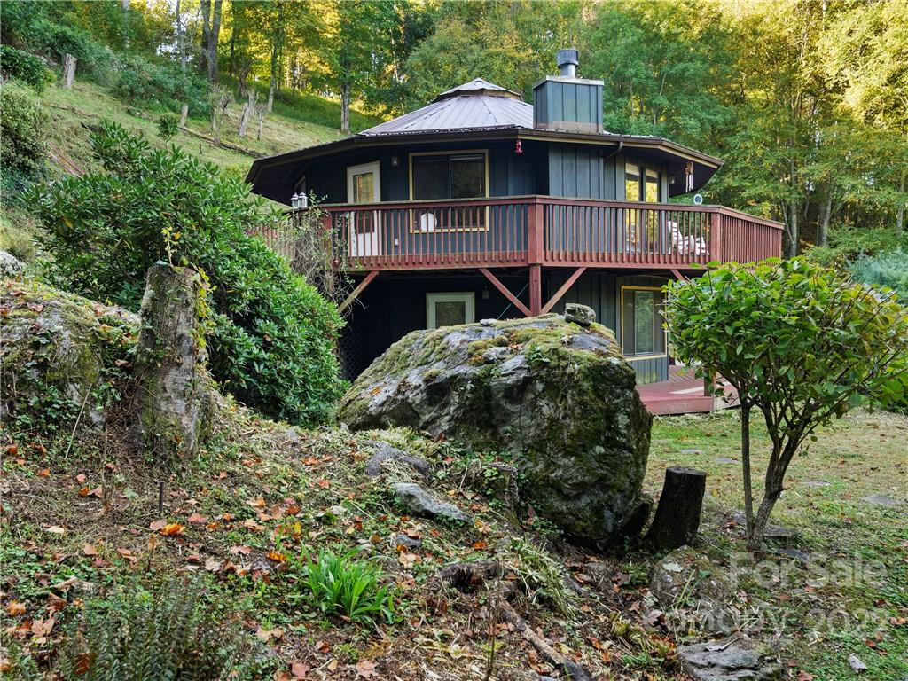 850 Mt Valley Road Waynesville, NC 28785 - Photo 6 of 22 a front view of a house with a yard