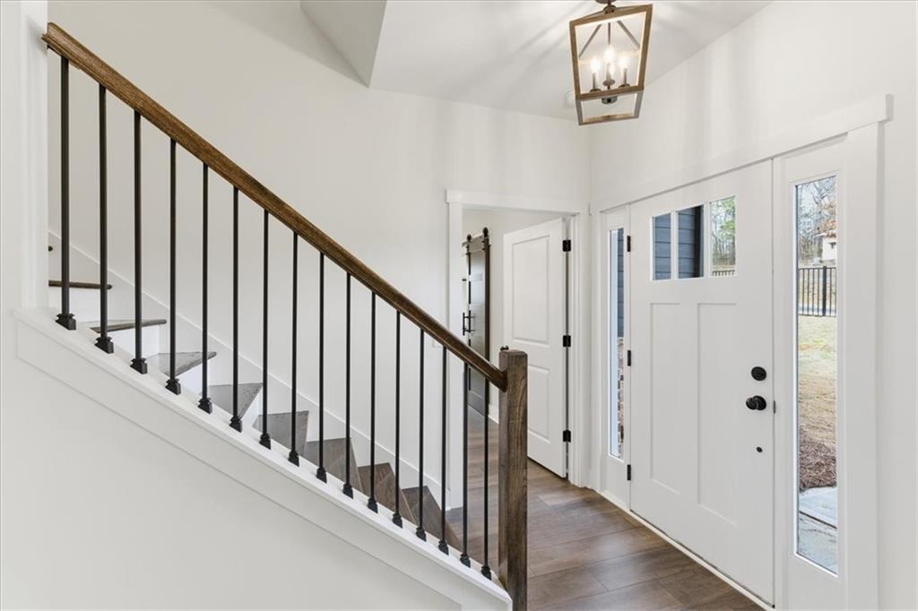 135 Old Alabama Road Southeast Emerson, GA 30137 - Photo 4 of 57 a view of a hallway with wooden floor and staircase
