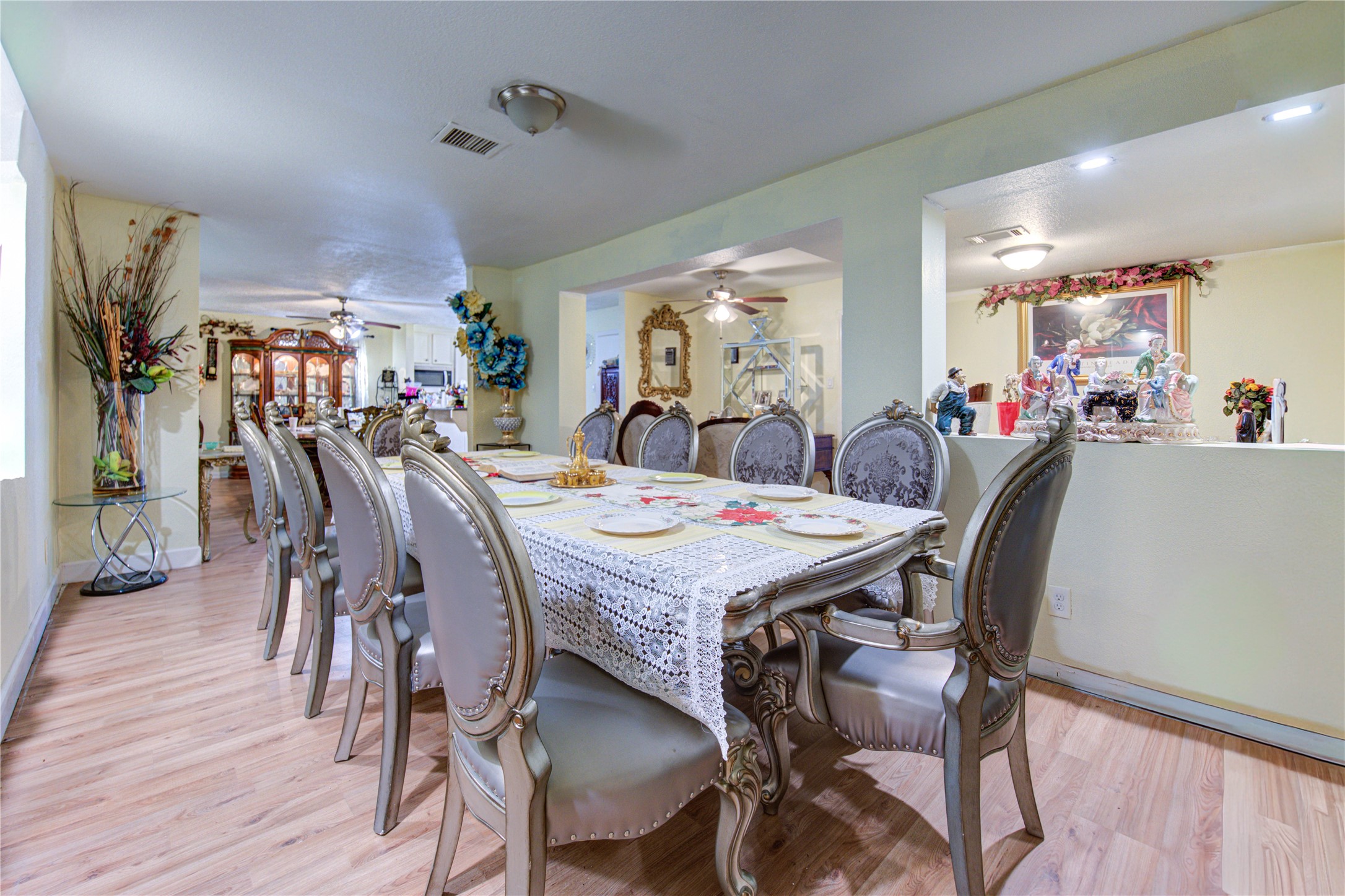 1219 Pilot Point Drive Houston, TX 77038 - Photo 4 of 19 a view of a dining room with furniture and wooden floor