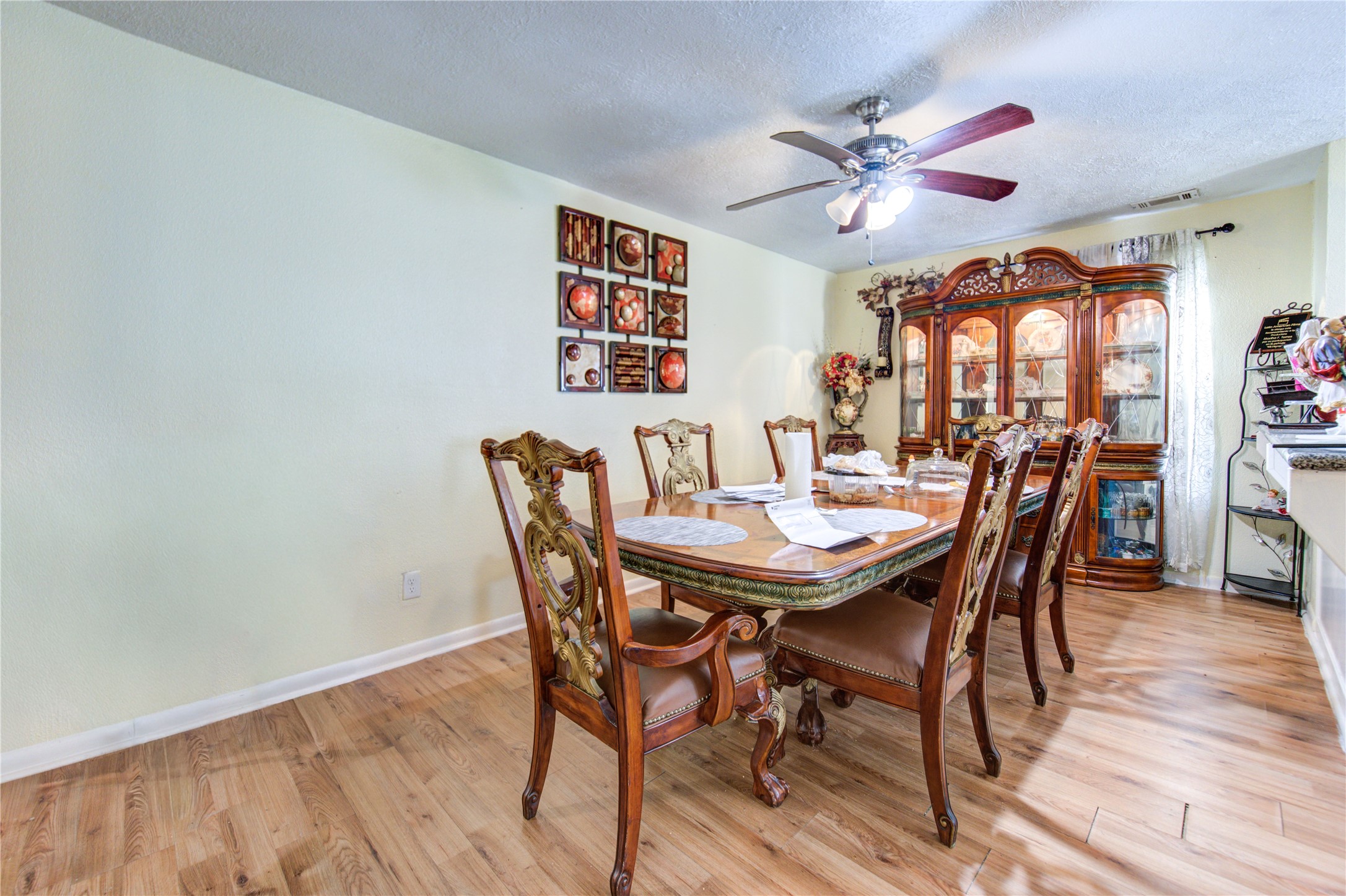 1219 Pilot Point Drive Houston, TX 77038 - Photo 6 of 19 a view of a dining room with furniture and wooden floor