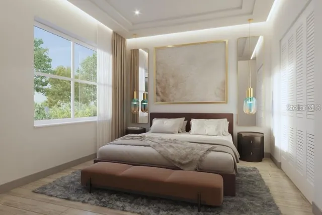 a bed room with a bed and a couch