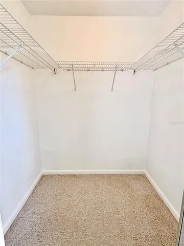 a view of a room with racks on the wall