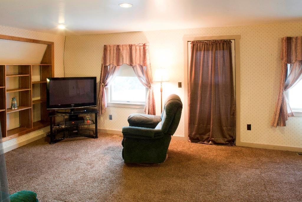 1223 Great Pond Road Aurora, ME 04408 - Photo 9 of 28 Door provides access to front balcony