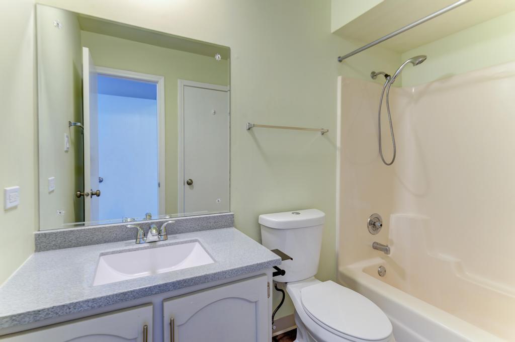 381 Pearson Circle Naperville, IL 60563 - Photo 12 of 43 a bathroom with a sink toilet vanity and shower