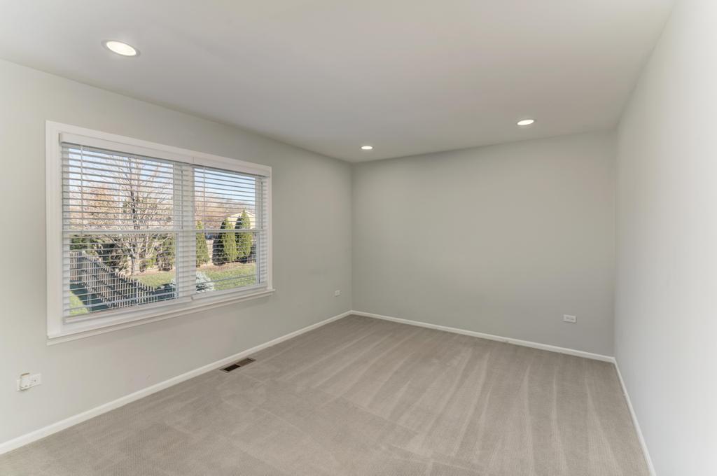 381 Pearson Circle Naperville, IL 60563 - Photo 13 of 43 an empty room with a window