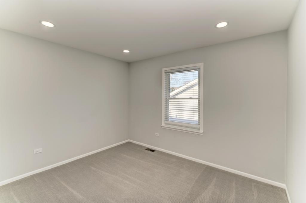 381 Pearson Circle Naperville, IL 60563 - Photo 15 of 43 an empty room with a window