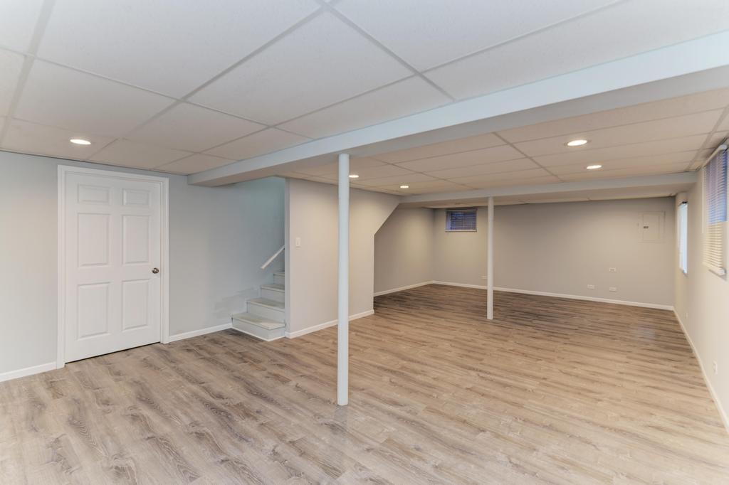 381 Pearson Circle Naperville, IL 60563 - Photo 21 of 43 wooden floor in an empty room with a window