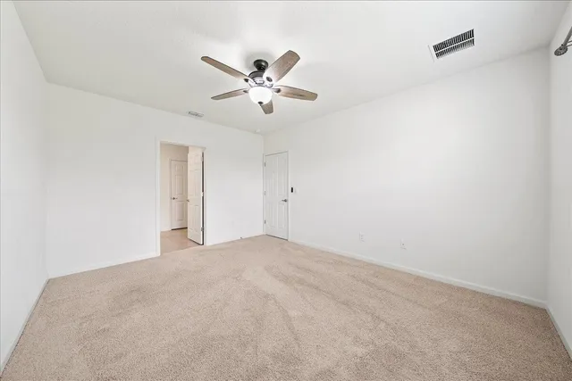 a bathroom with a granite countertop sink mirror and