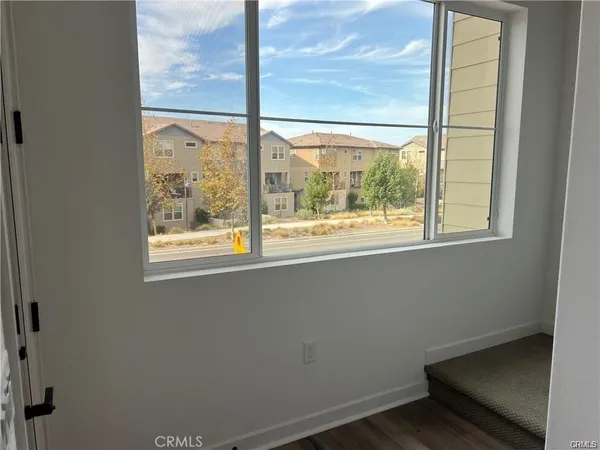a kitchen with granite countertop a stove and a sink