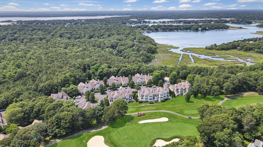 4 Quinns Way, Unit 4 Mashpee, MA 02649 - Photo 27 of 29 a view of a city