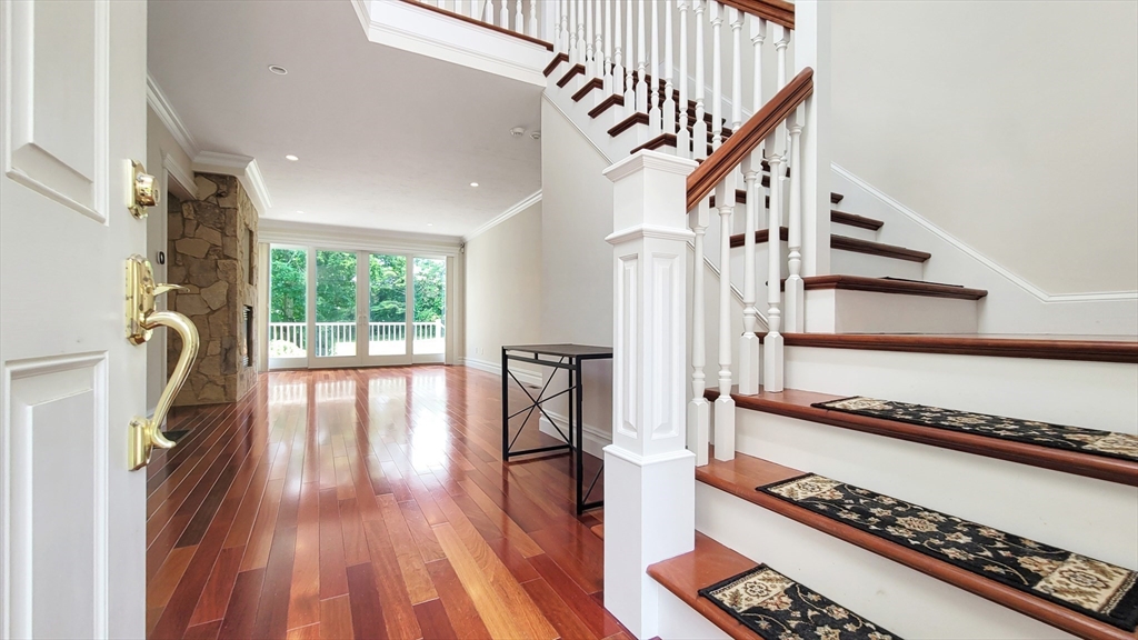 4 Quinns Way, Unit 4 Mashpee, MA 02649 - Photo 5 of 29 a view of entryway and hall with wooden floor