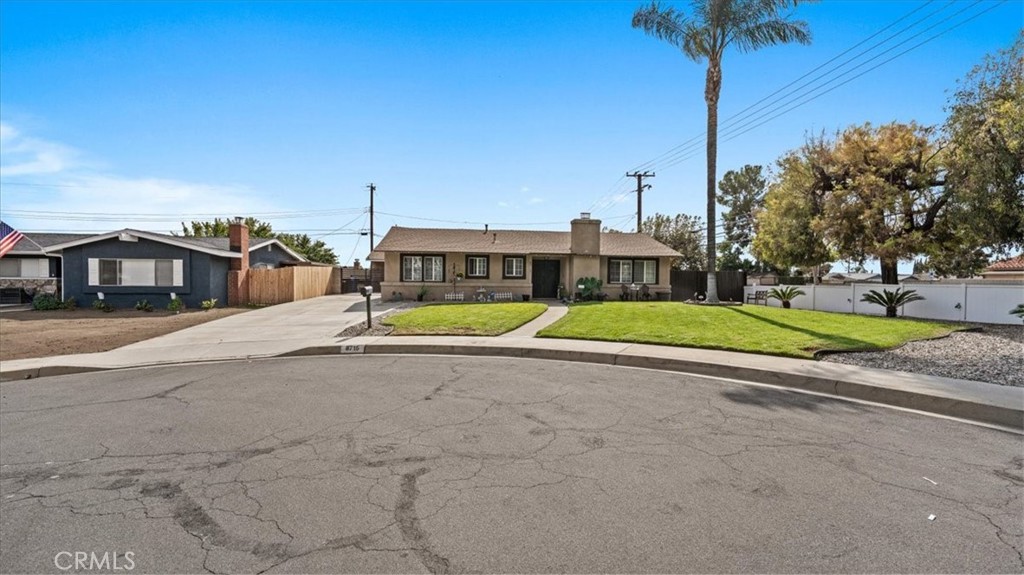 8715 Lurline Street Rancho Cucamonga, CA 91701 - Photo 2 of 41 a view of a house with a swimming pool