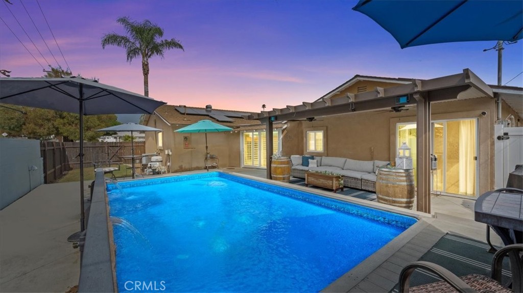 8715 Lurline Street Rancho Cucamonga, CA 91701 - Photo 28 of 41 a view of a house with backyard and sitting area