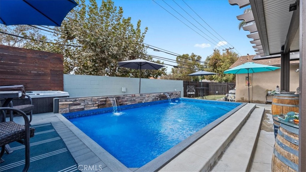 8715 Lurline Street Rancho Cucamonga, CA 91701 - Photo 30 of 41 an outdoor space with pool and furniture