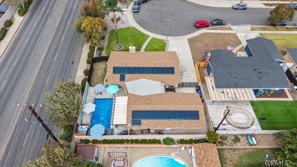 8715 Lurline Street Rancho Cucamonga, CA 91701 - Photo 39 of 41 an aerial view of a house with yard swimming pool and outdoor seating