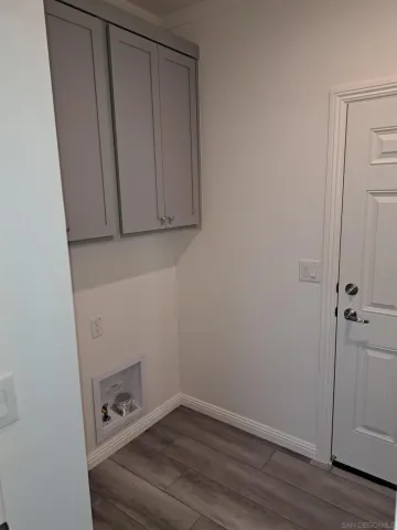 a bathroom with a toilet a sink and bathtub