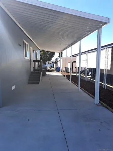 a room with lots of counter space and windows