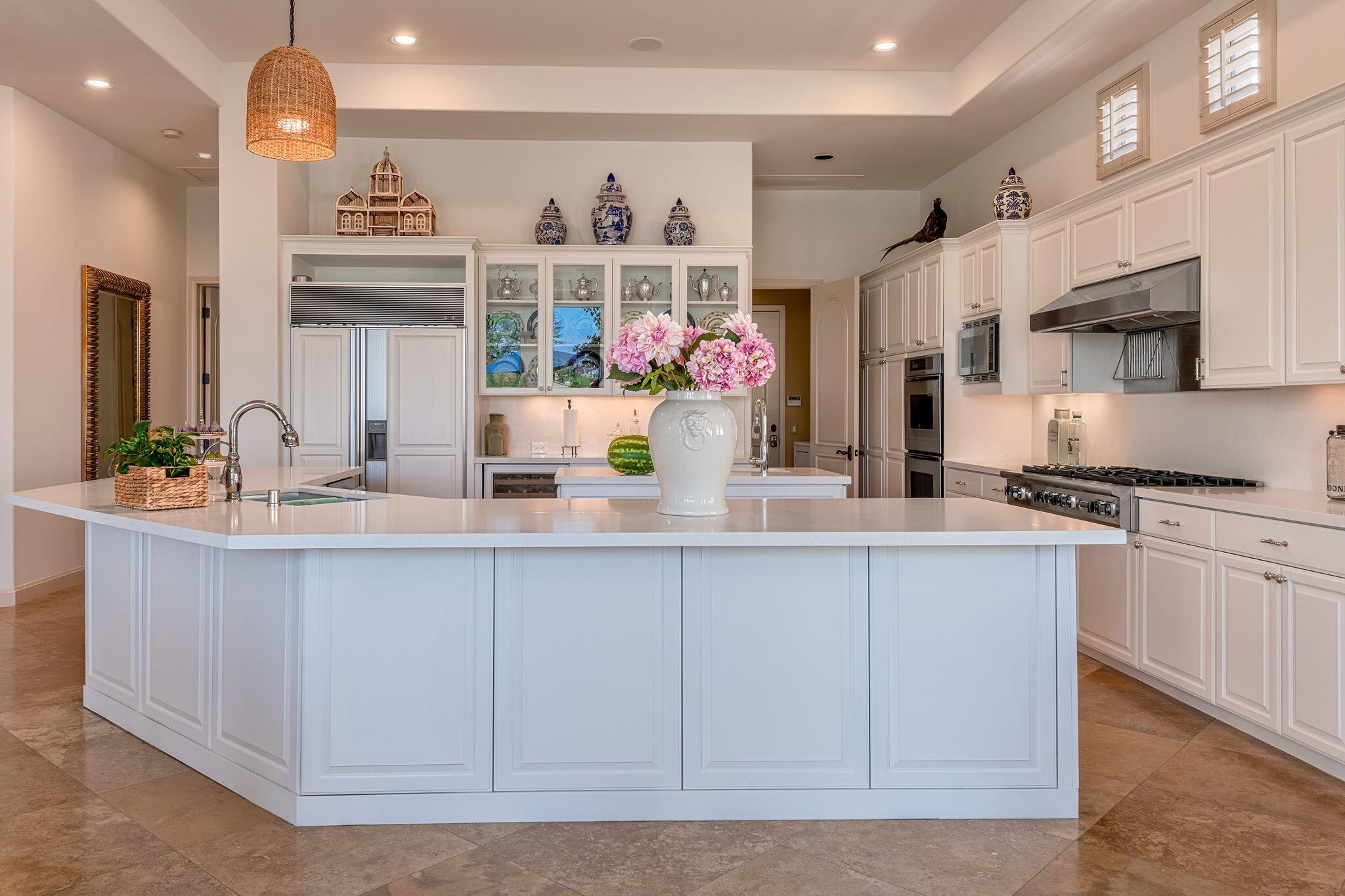 79434 Cetrino La Quinta, CA 92253 - Photo 15 of 35 a kitchen with stainless steel appliances granite countertop a sink and cabinets