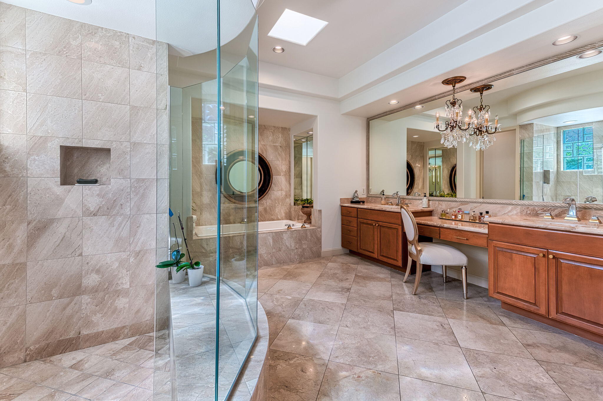 79434 Cetrino La Quinta, CA 92253 - Photo 26 of 35 a bathroom with a double vanity sink a mirror and a shower