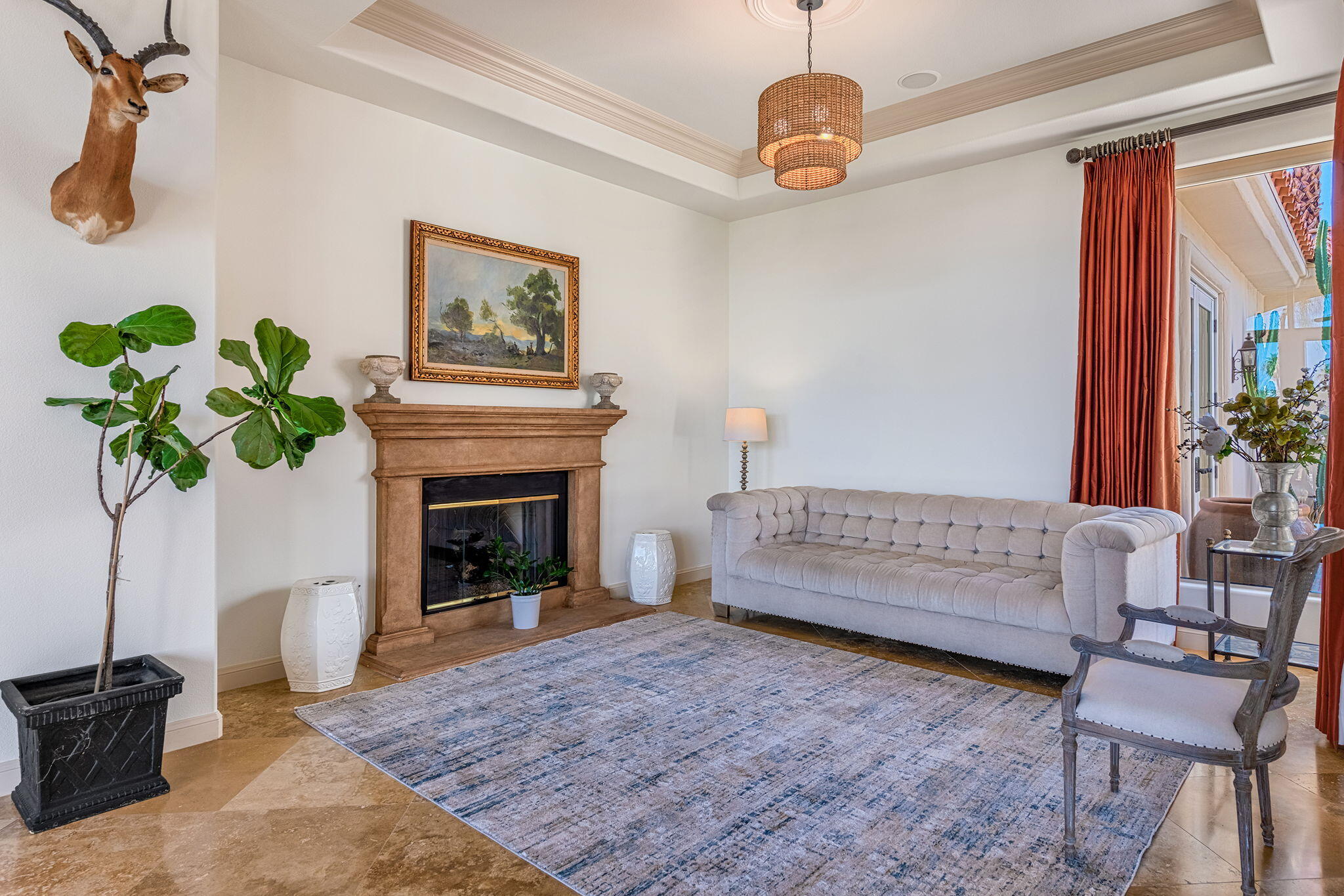 79434 Cetrino La Quinta, CA 92253 - Photo 8 of 35 a living room with furniture a window and a fireplace