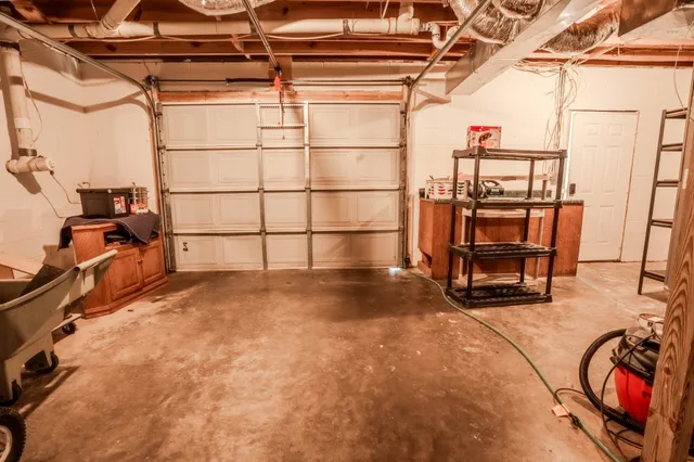 a view of a swimming pool with an outdoor seating space