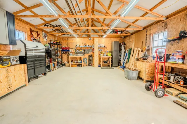 a view of an outdoor space with trees all around
