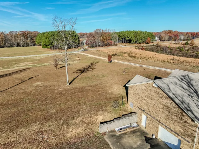 a view of swimming pool with seating space