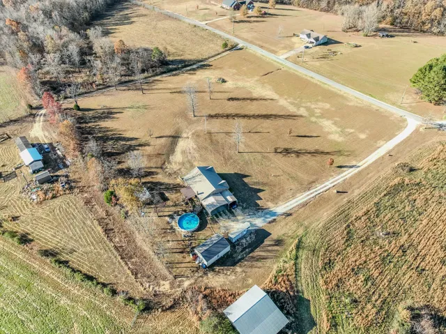 a view of swimming pool with a yard