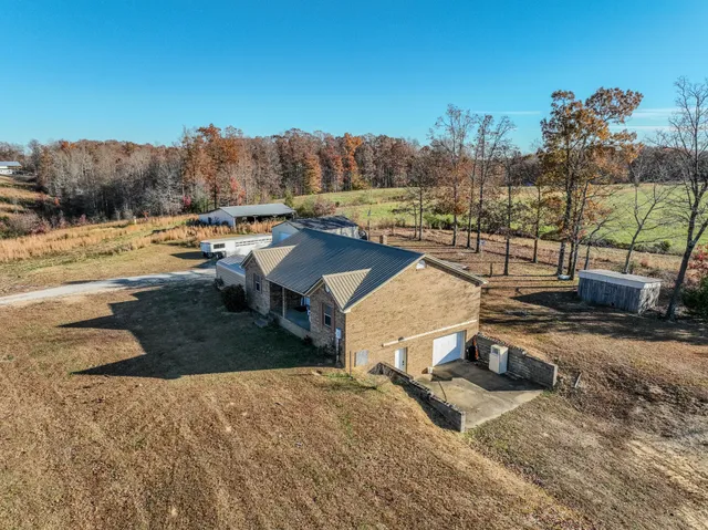 a view of a house with large space and balcony