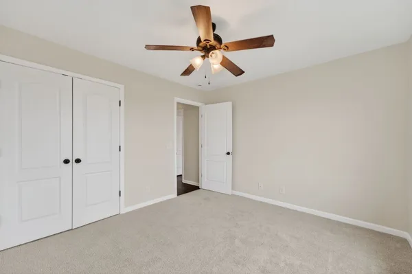 a view of room with ceiling fan
